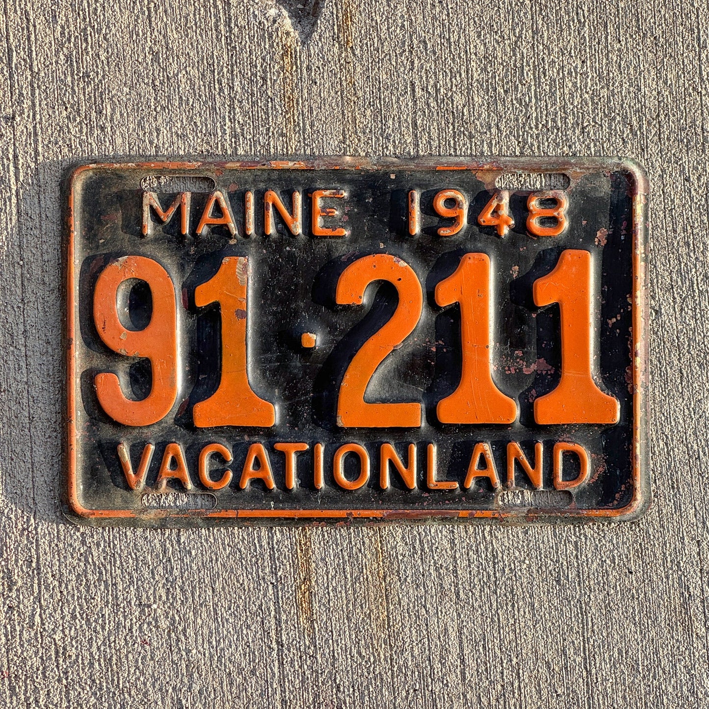 Photo of a 1948 Maine License Plate Auto Tag Garage Decor Vintage Brass 91 211