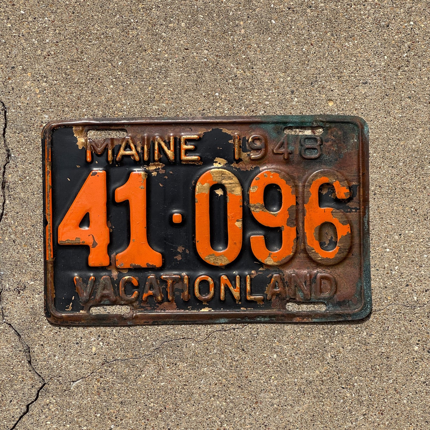 Photo of a 1948 Maine License Plate Auto Tag Garage Decor Vintage Vacationland Brass 41 096