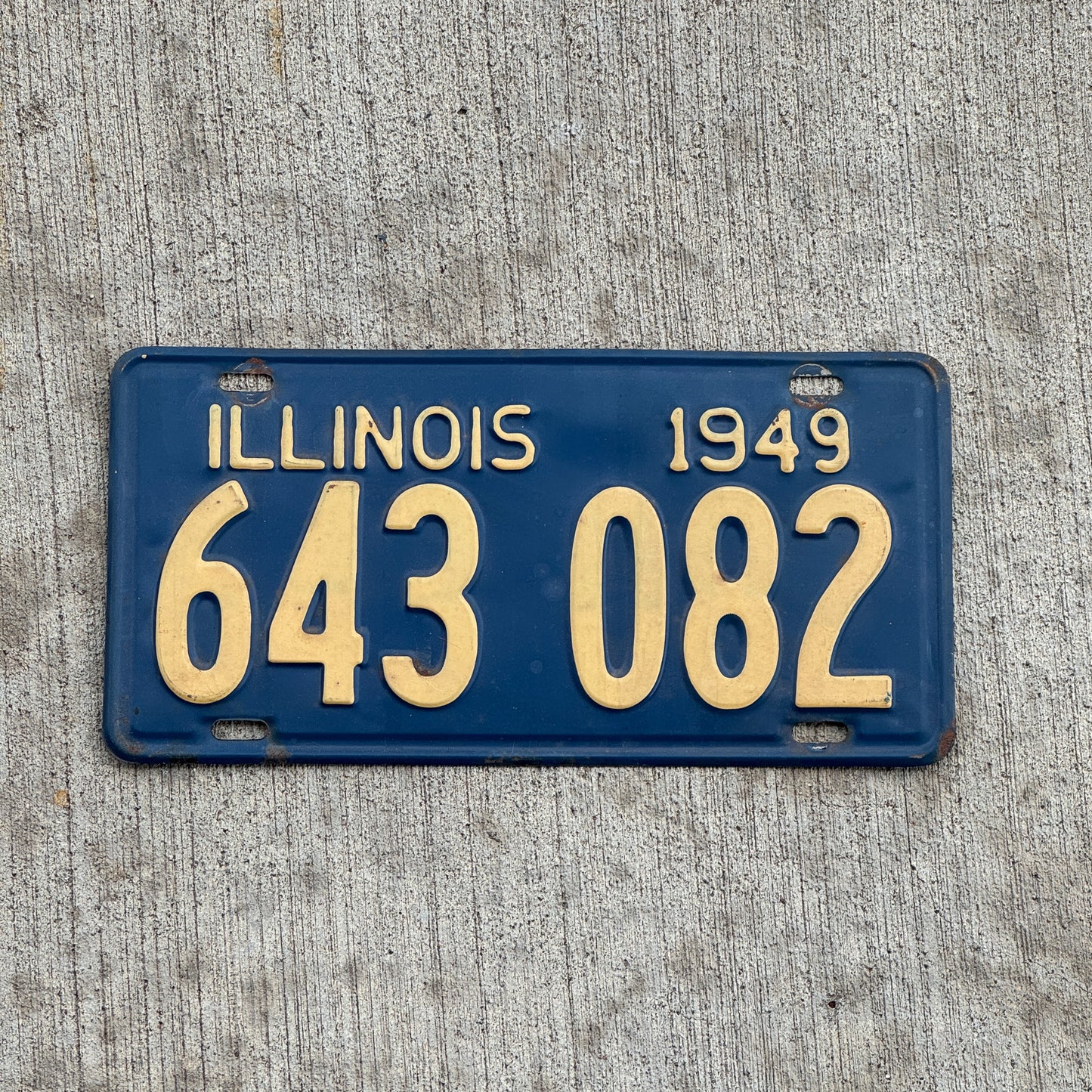 Photo of a 1949 Illinois License Plate Auto Tag Garage Decor Vintage 643 082 with original patina