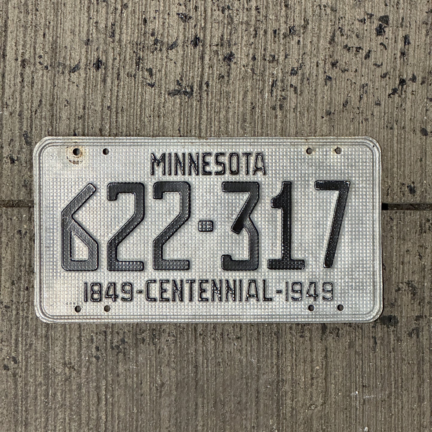 Photo of a 1949 Minnesota License Plate Auto Tag Garage Decor Vintage Waffle Design 622 317 with original patina