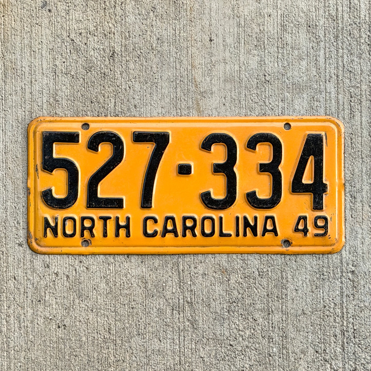 Photo of a 1949 North Carolina License Plate Auto Tag Garage Decor Vintage High Quality 527 334 with original patina