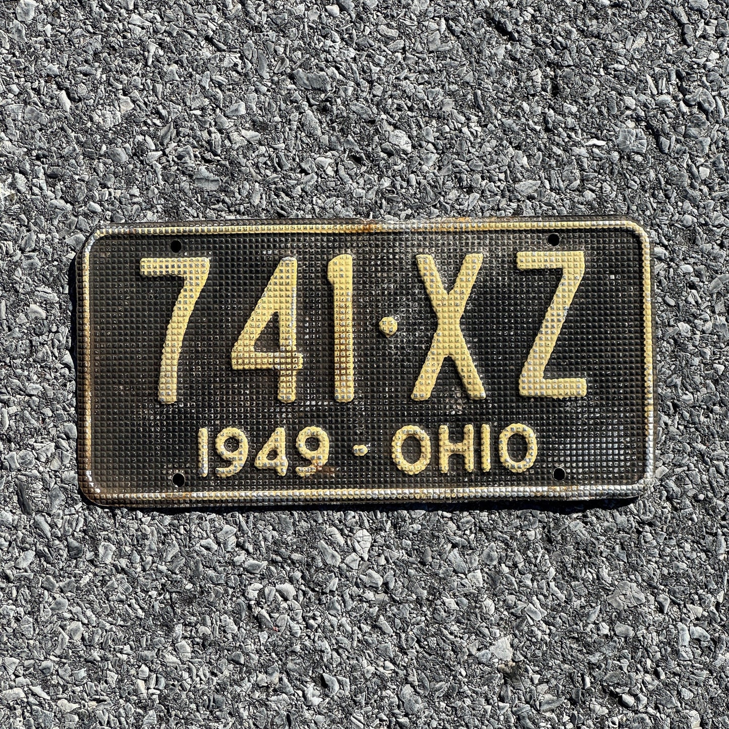 Photo of a 1949 Ohio License Plate Auto Tag Garage Decor Vintage Waffle Style 741 XZ