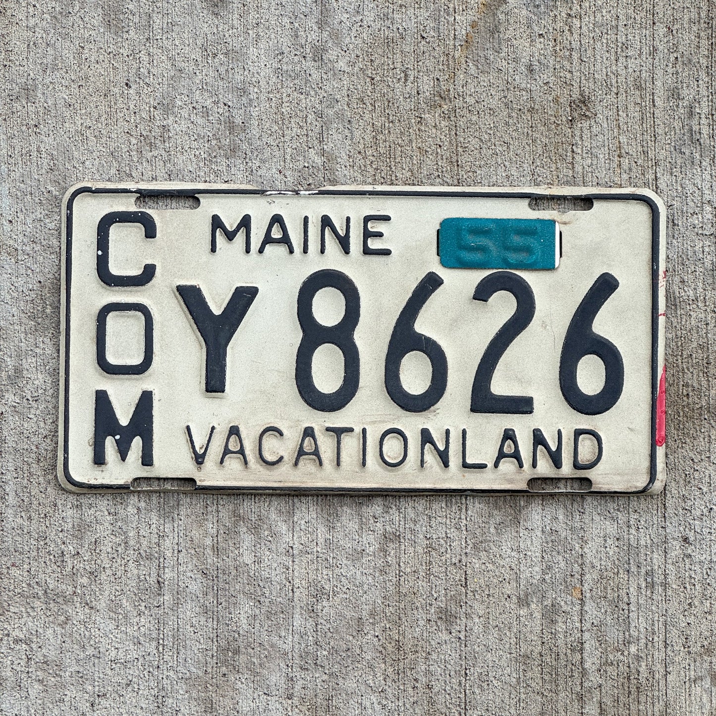 Photo of a 1950 1955 Maine Commercial License Plate Auto Tag 1 Vintage Garage 1955 Tab Y 8626 with original patina