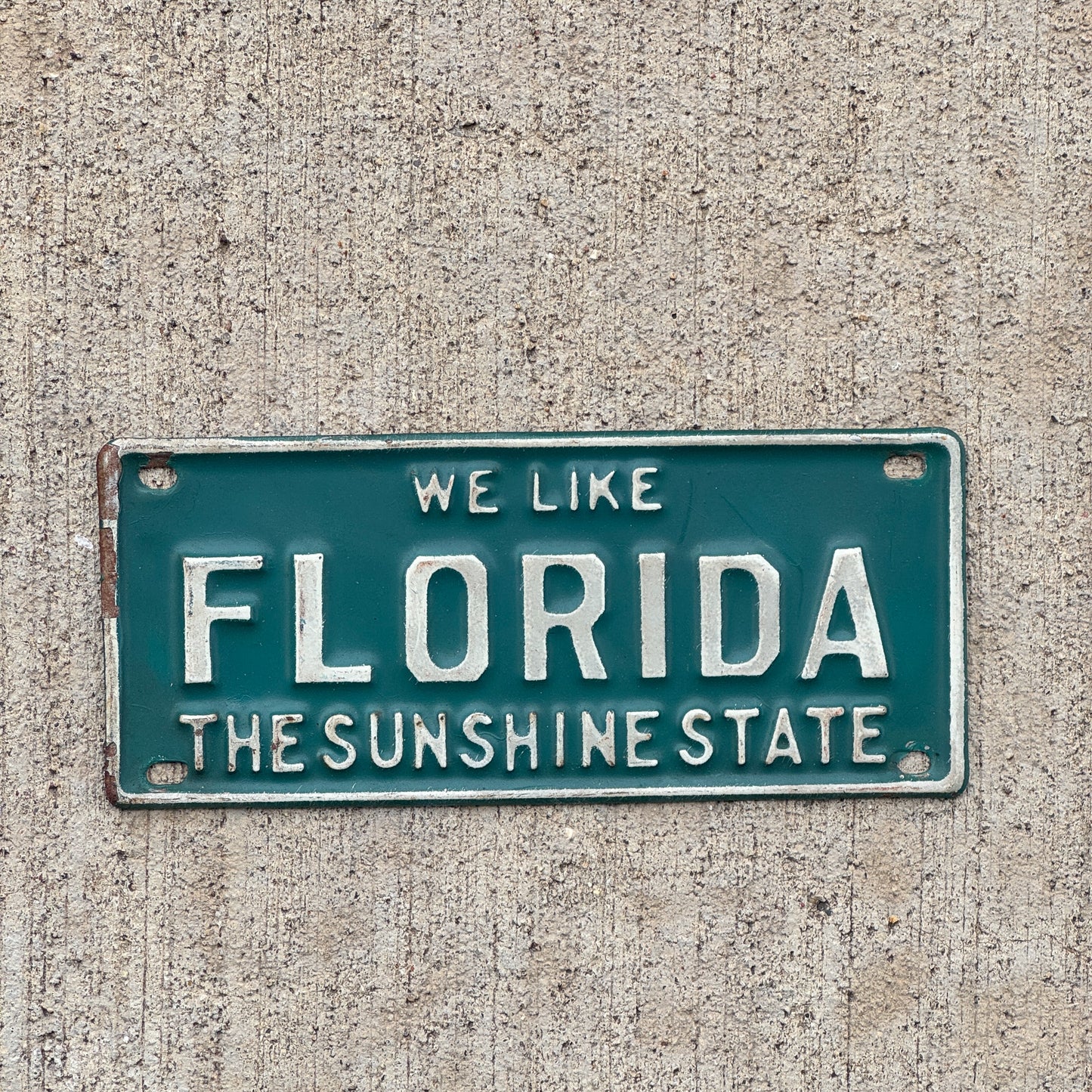 Photo of a 1950 Era Florida Auto Tag Garage Decor Vintage Sunshine State with original patina