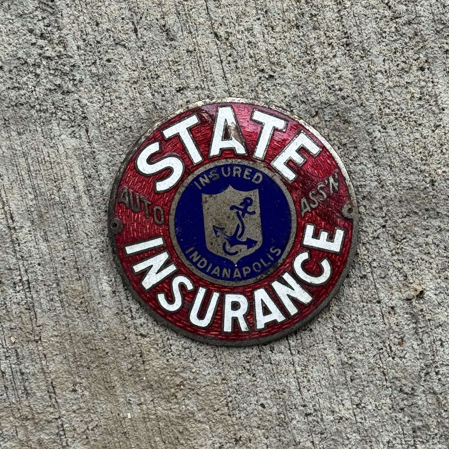 Photo of a 1950 Era Indianapolis State Insurance Indiana Porcelain Badge Emblem License Plate Topper Auto Tag Garage Decor Vintage with original patina