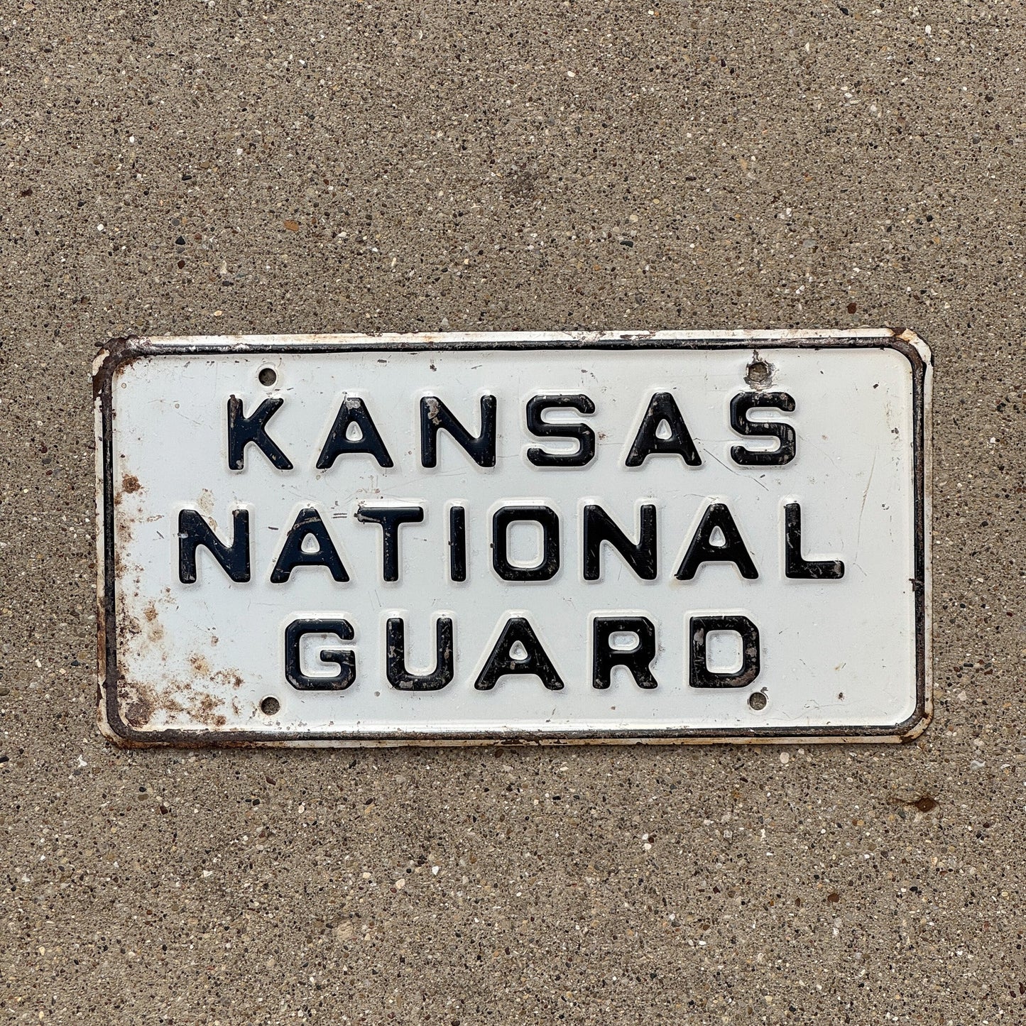 Photo of a 1950 Era Kansas National Guard Booster License Plate Auto Tag Garage Decor Vintage