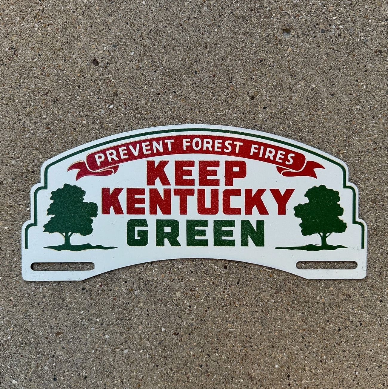 Photo of a 1950 Era Keep Kentucky License Plate Topper Auto Tag Garage Decor Vintage Forest Fire Conservation with original patina