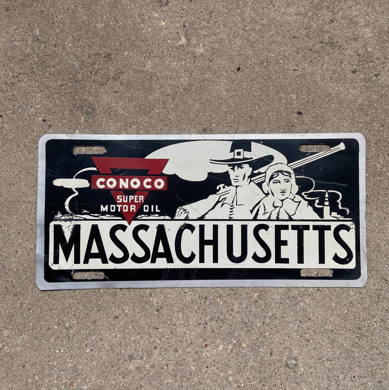 Photo of a 1950 Era Massachusetts Booster License Plate Auto Tag Garage Decor Vintage Conoco Gas Advertising Super Motor Oil with original patina