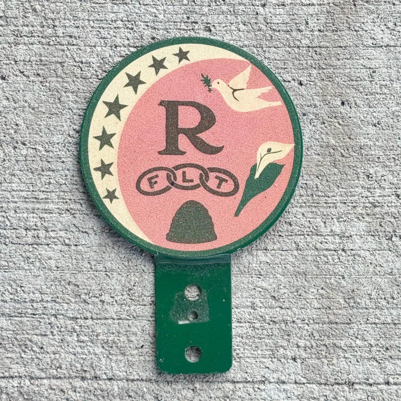 Photo of a 1950 Era Rebekahs Women Odd Fellows License Plate Topper Auto Tag Garage Decor Vintage Smaltz Paint Pink IOOF Lodge with original patina