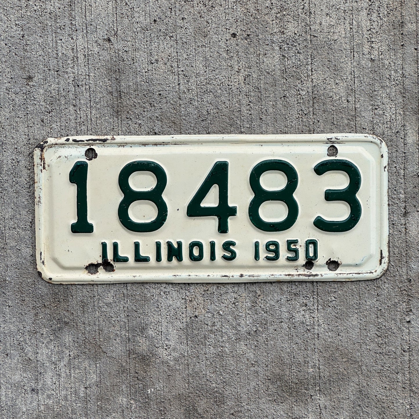 Photo of a 1950 Illinois Motorcycle License Plate Auto Tag Garage Decor Vintage 18483 with original patina