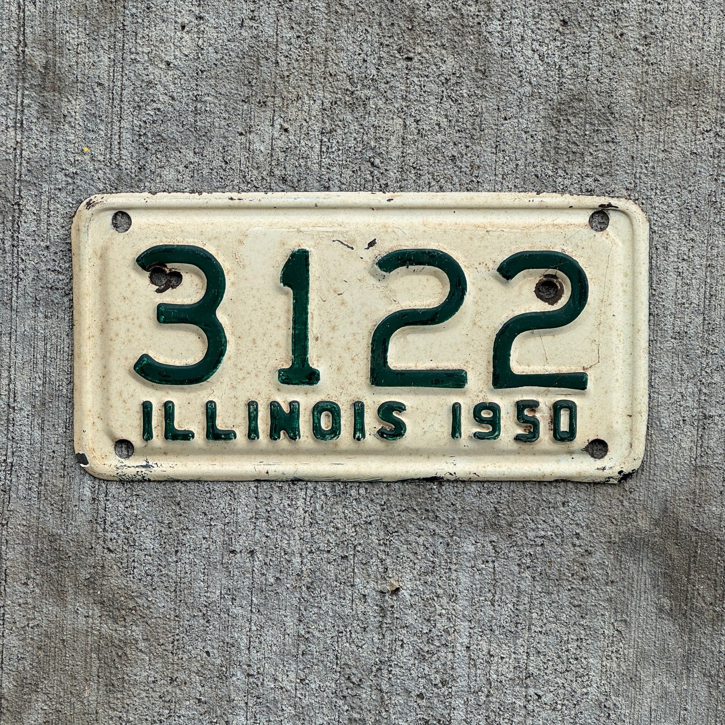 Photo of a 1950 Illinois Motorcycle License Plate Auto Tag Garage Decor Vintage Low Number Four Digit 3122 with original patina