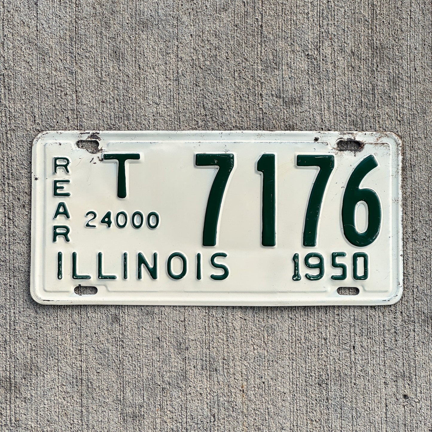 Photo of a 1950 Illinois Truck Mileage Tax Rear License Plate Auto Tag 2 Vintage Garage 24000 LBS T 7176 with original patina
