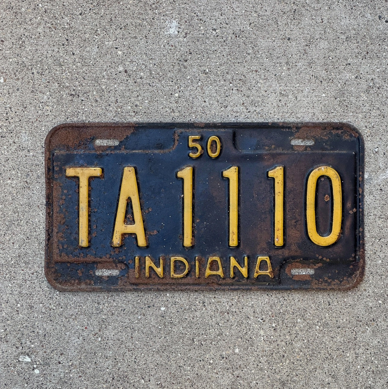 Photo of a 1950 Indiana License Plate Auto Tag Garage 111 Repeating 111 Repeating TA 1110