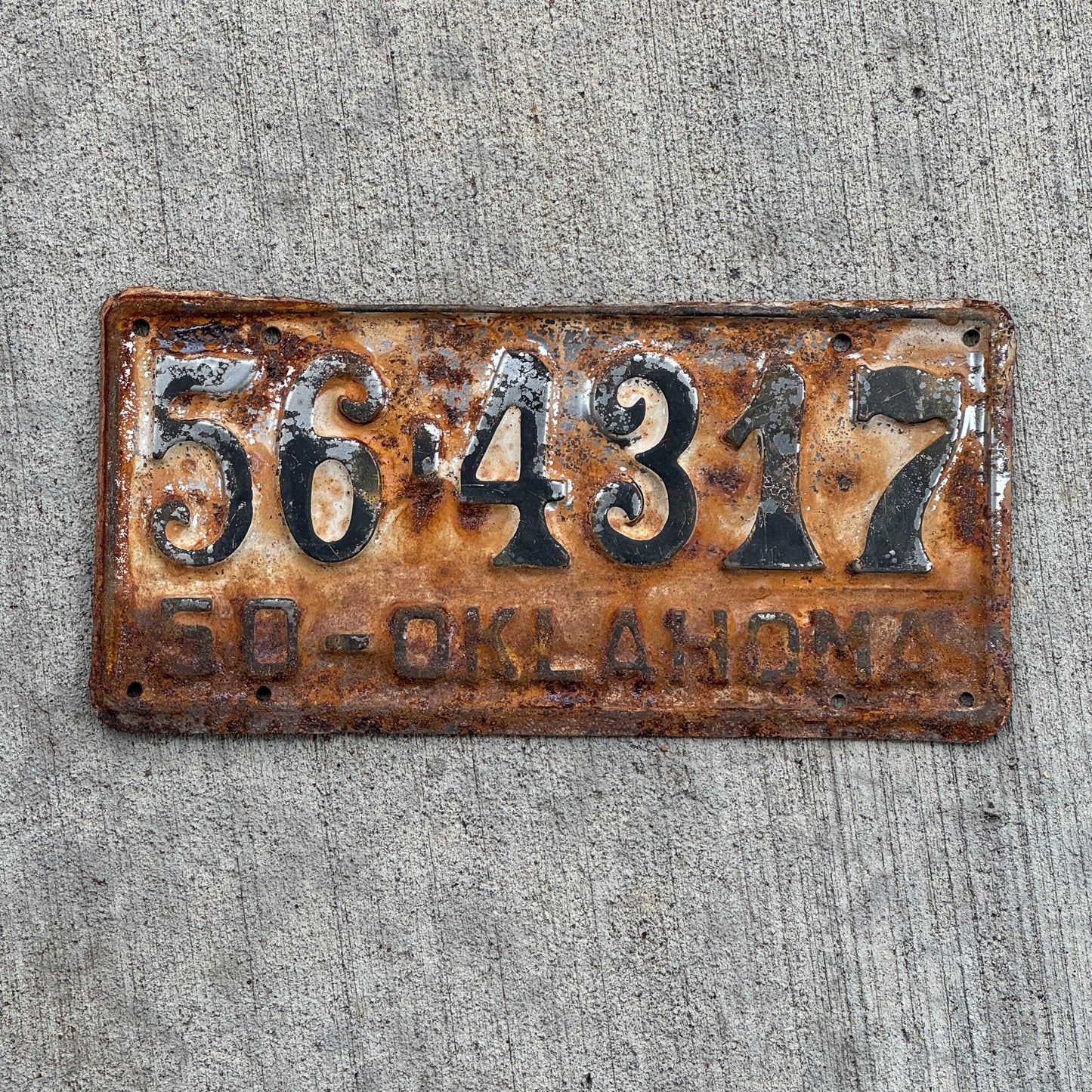 Photo of a 1950 Oklahoma License Plate Auto Tag Garage Decor Vintage 56 4317 with original patina