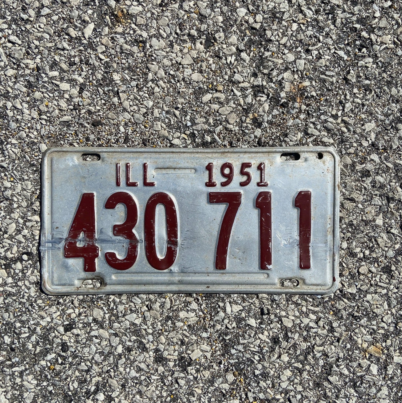 Photo of a 1951 Illinois License Plate Auto Tag Garage Decor Vintage Silver Red 430 711 711430 711