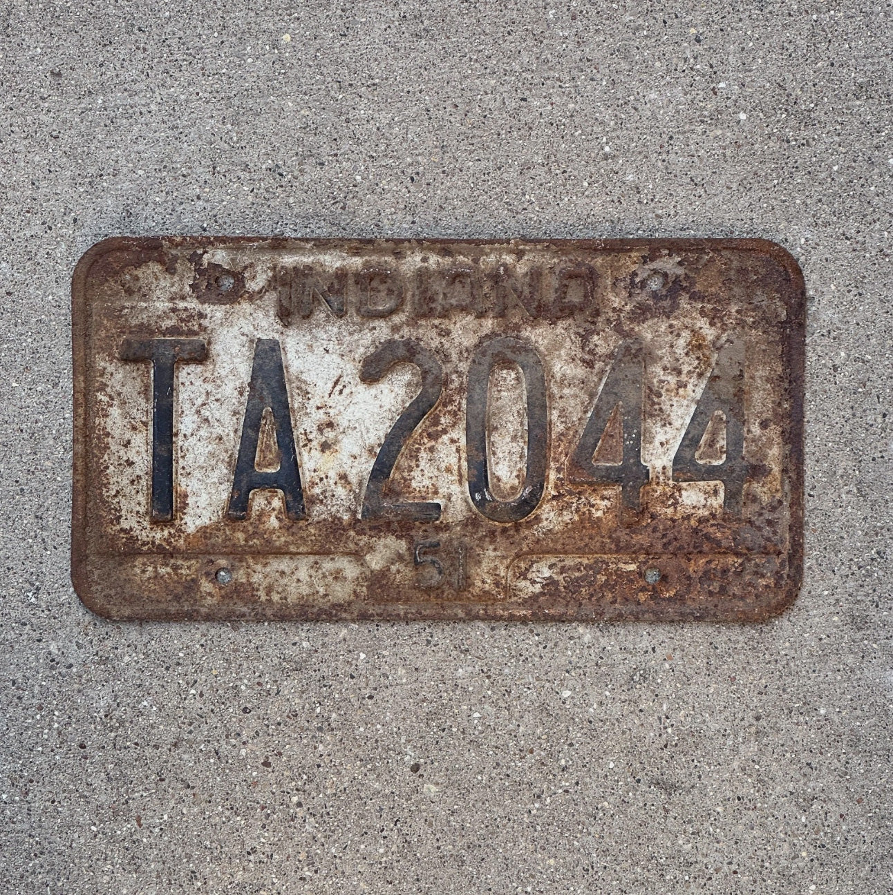Photo of a 1951 Indiana License Plate Auto Tag Garage Decor TA 2044