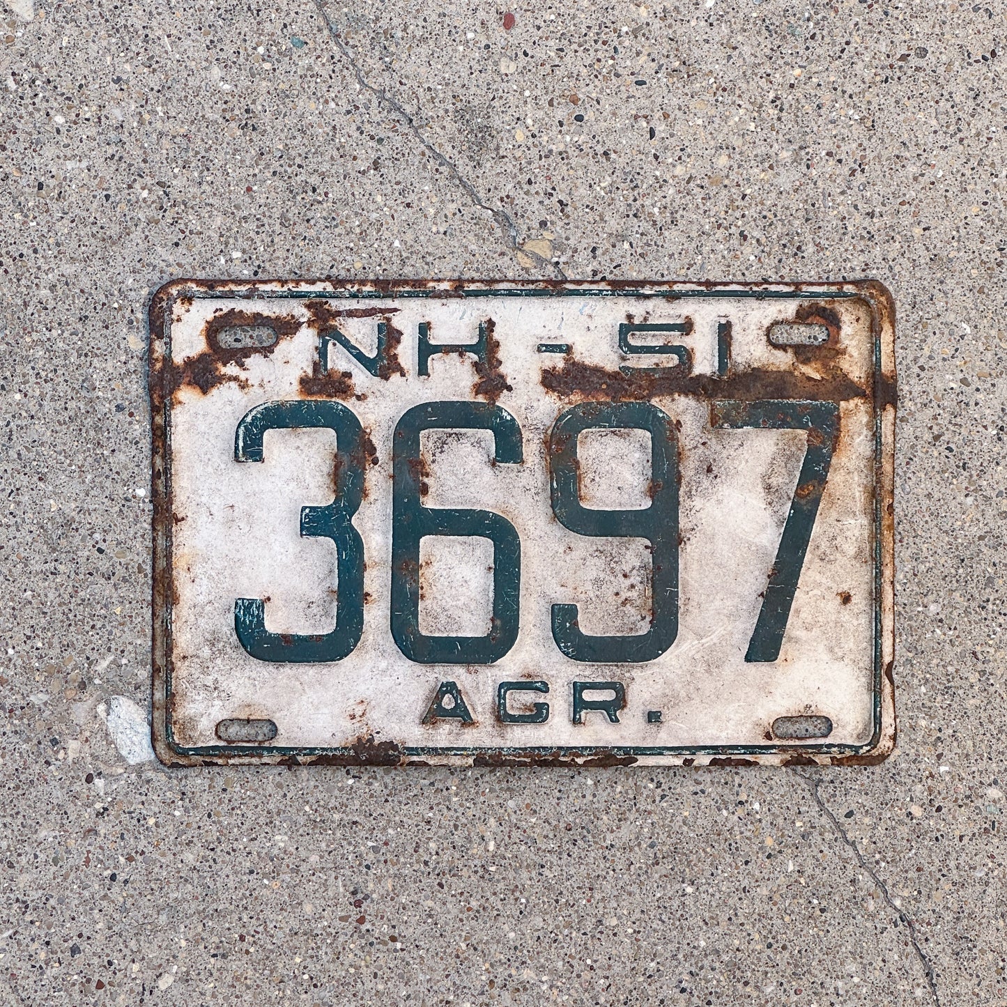 Photo of a 1951 New Hampshire Agricultural License Plate Auto Tag Garage Decor Vintage 3697 with original patina