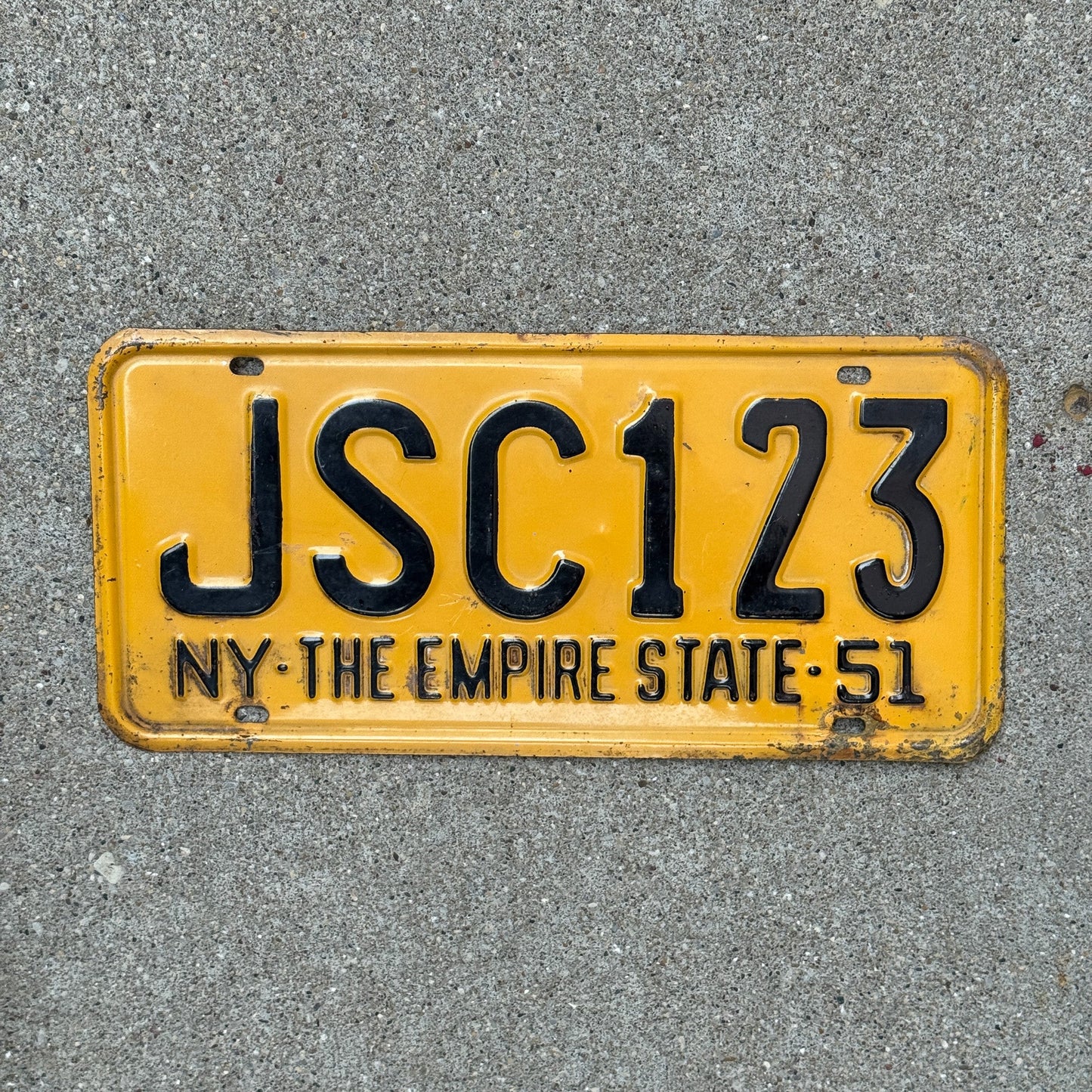Photo of a 1951 New York Supreme Court Justice License Plate Auto Tag Garage Decor Vintage Judge JSC 123 with original patina