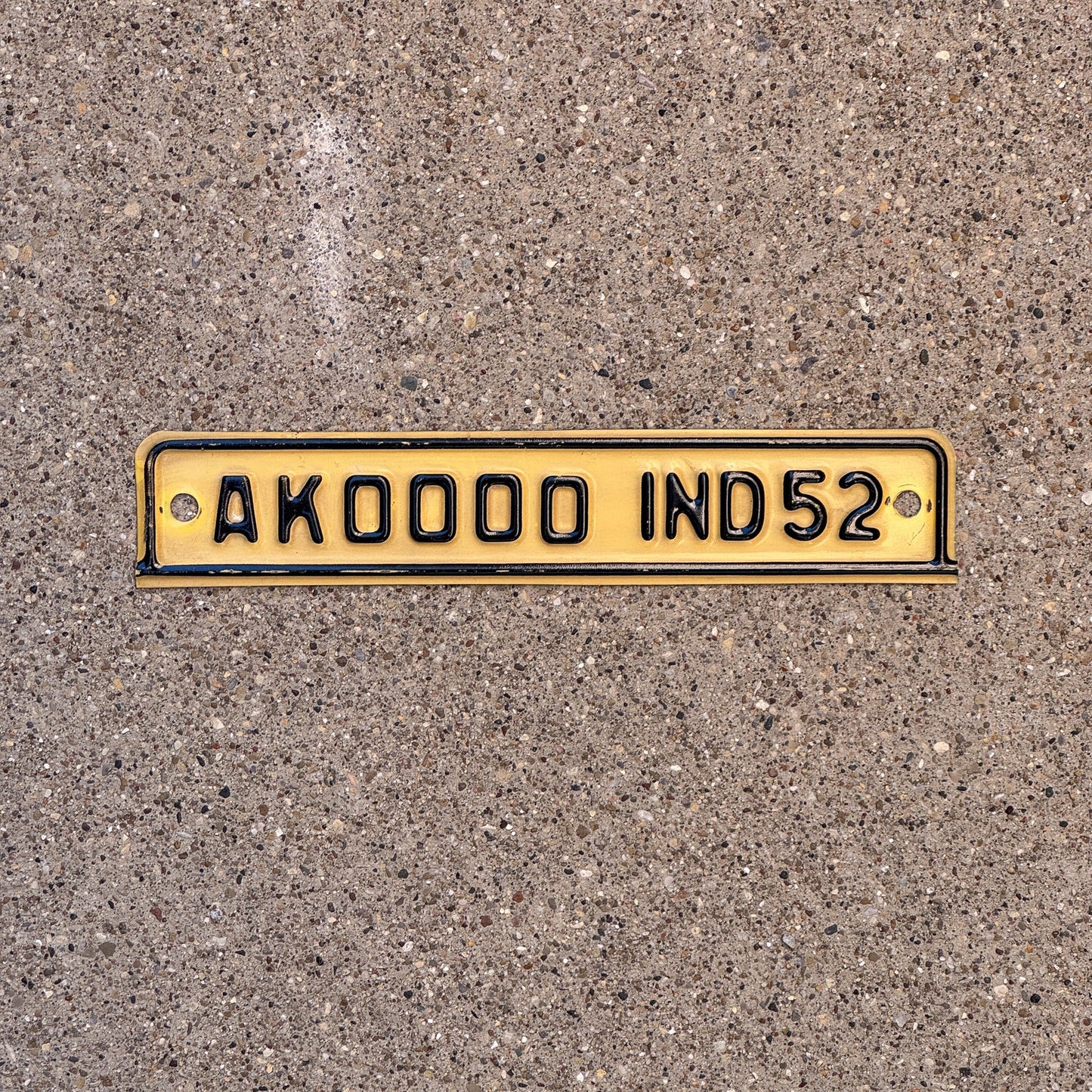 Photo of a 1952 Indiana Sample Tab License Plate Auto Tag 1 Garage Decor AK 0000 with original patina