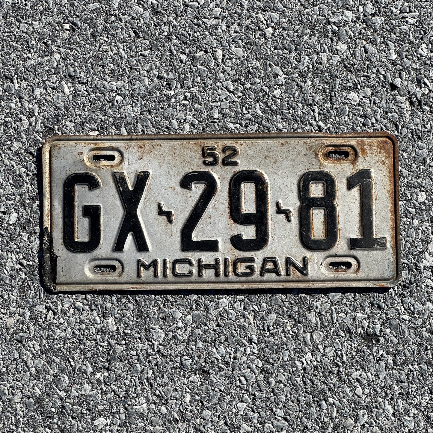 Photo of a 1952 Michigan License Plate Auto Tag Garage Decor Vintage GX 29 81
