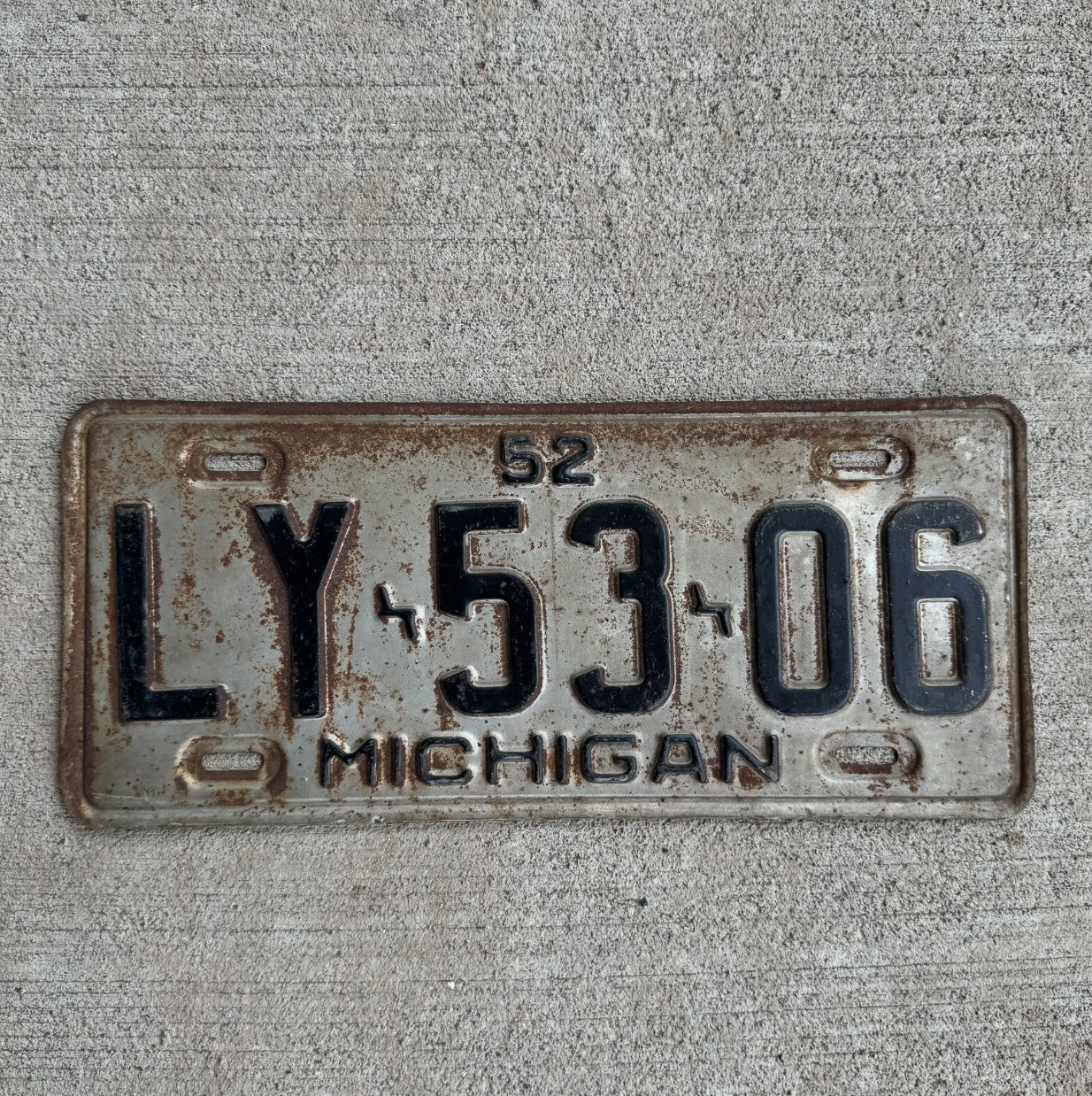 Photo of a 1952 Michigan License Plate Auto Tag Garage Decor Vintage LY 5306
