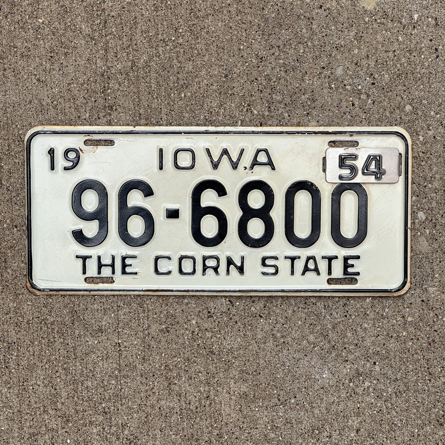 Photo of a 1953 1954 Iowa License Plate Auto Tag Garage Decor Vintage 96 6800 with original patina