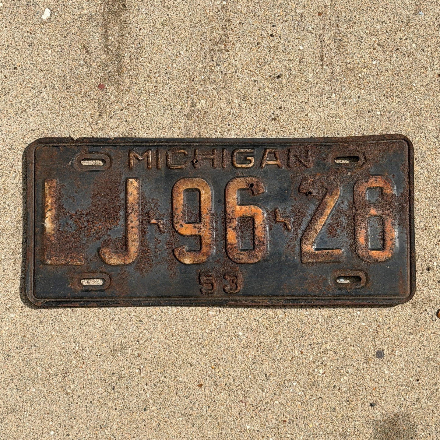 Photo of a 1953 Michigan License Plate Auto Tag Garage Decor Vintage LJ 96 26 with original patina