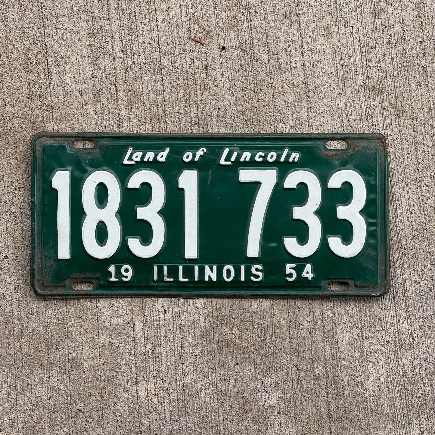 Photo of a 1954 Illinois License Plate Auto Tag Garage Decor Vintage 1 831 733 with original patina