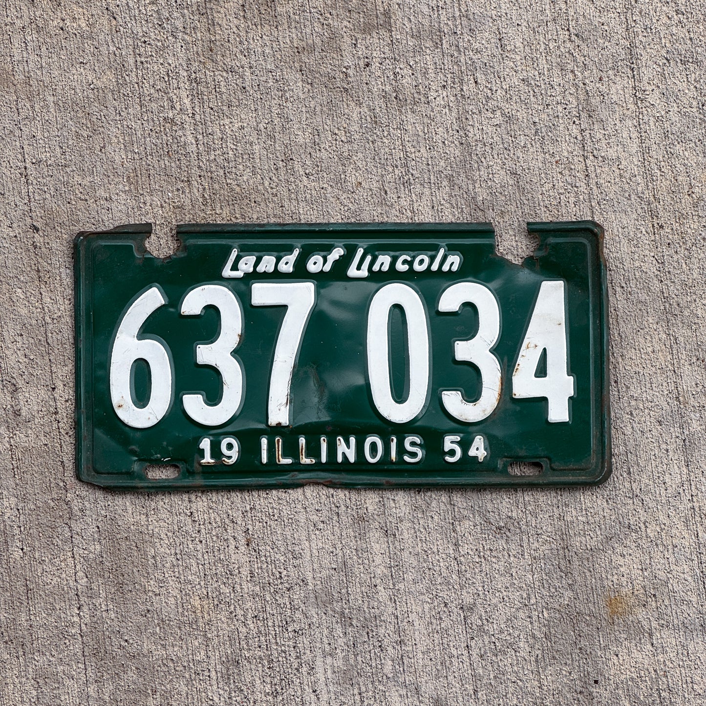 Photo of a 1954 Illinois License Plate Auto Tag Garage Decor Vintage 637 034 with original patina