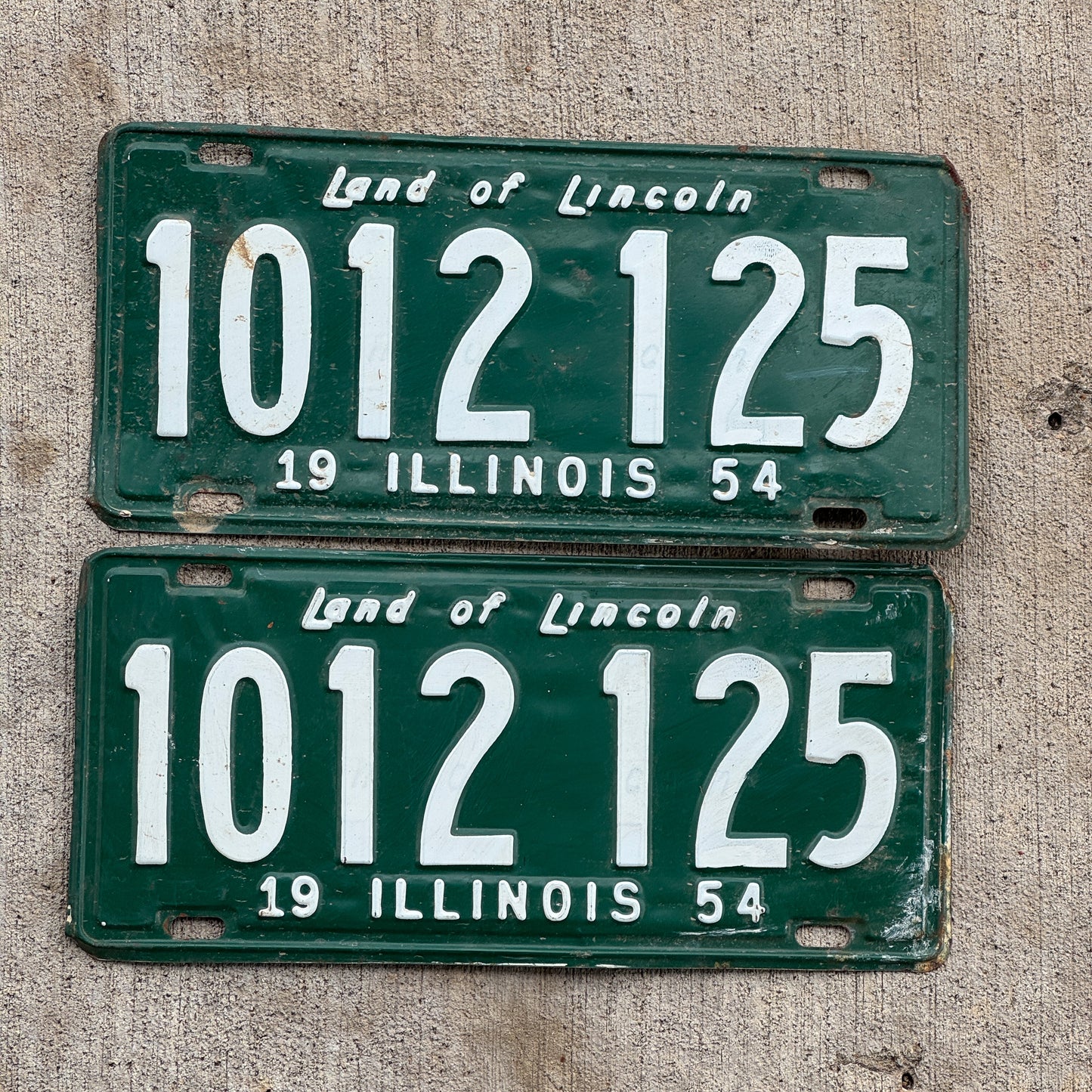 Photo of a 1954 Illinois License Plate Pair Auto Tag Garage Decor Vintage 1 012 125 with original patina