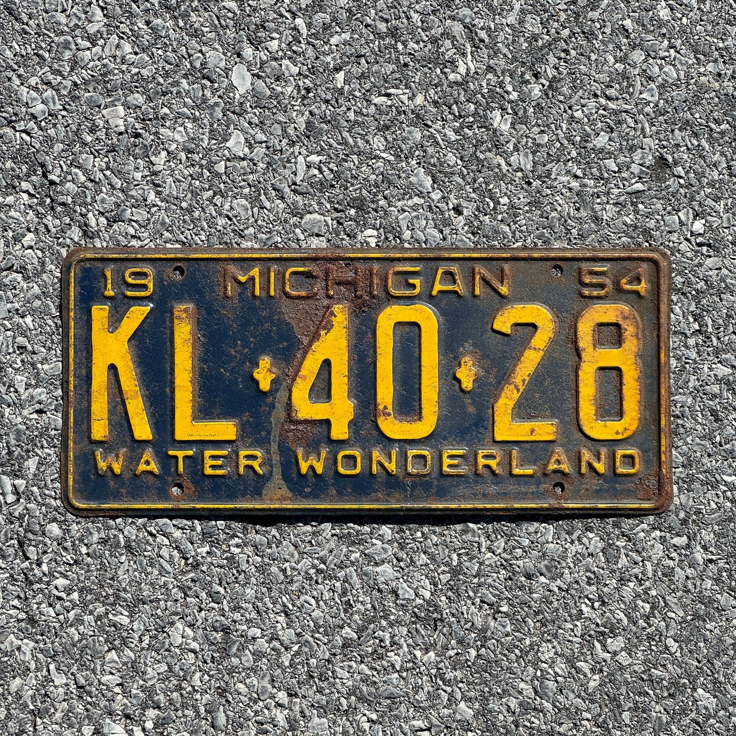Photo of a 1954 Michigan License Plate Auto Tag Garage Decor Vintage KL 40 28