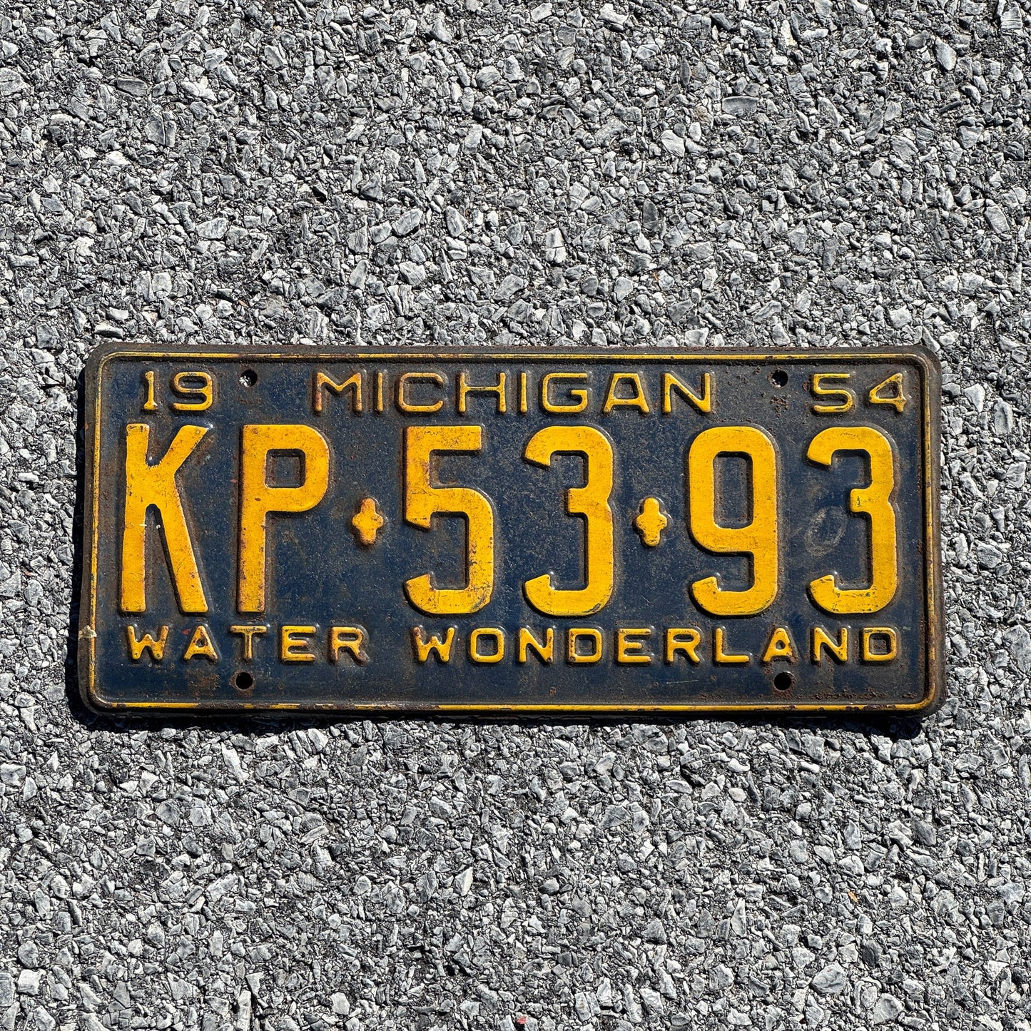Photo of a 1954 Michigan License Plate Auto Tag Garage Decor Vintage KP 5393