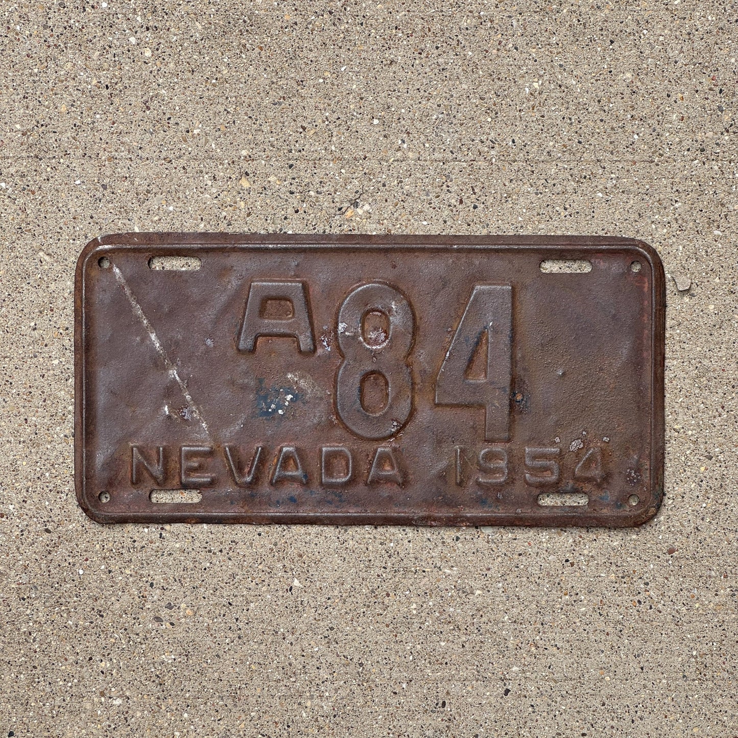 Photo of a 1954 Nevada License Plate Auto Tag Garage Decor Vintage Low Number Two Digit A 84