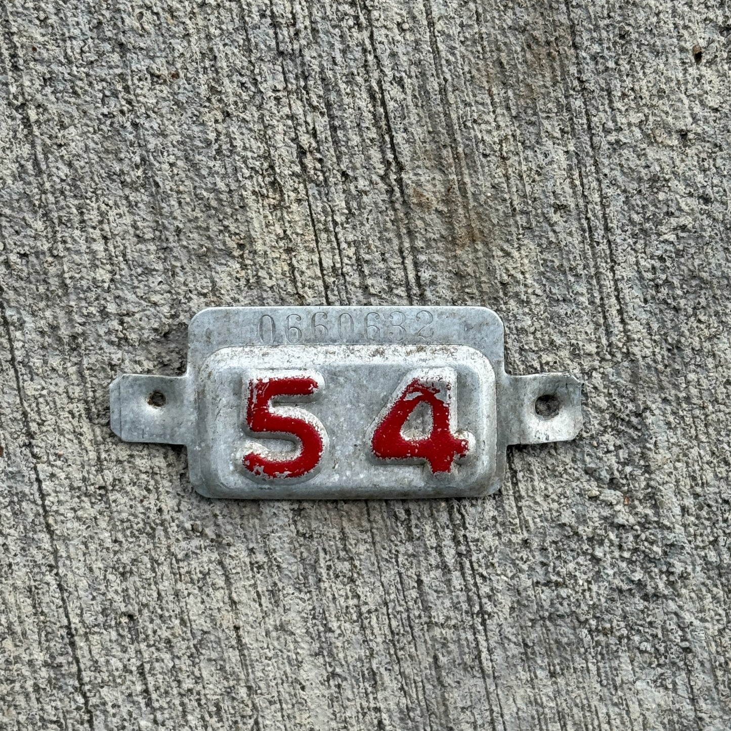 Photo of a 1954 New Jersey Tab License Plate Auto Tag Garage Decor Vintage 0660632 with original patina