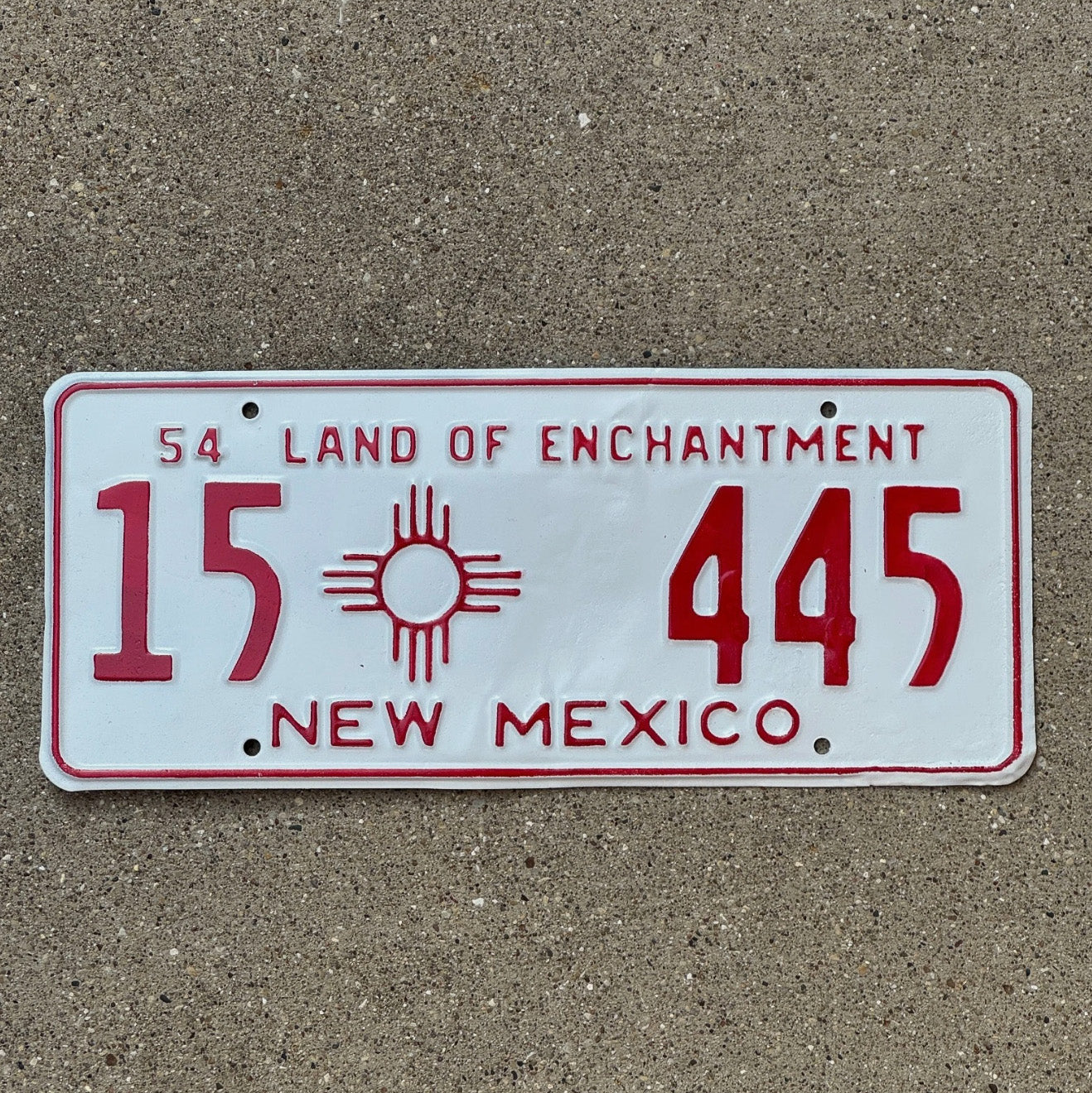 Photo of a 1954 New Mexico License Plate Auto Tag Garage Decor Vintage 15 445 with original patina