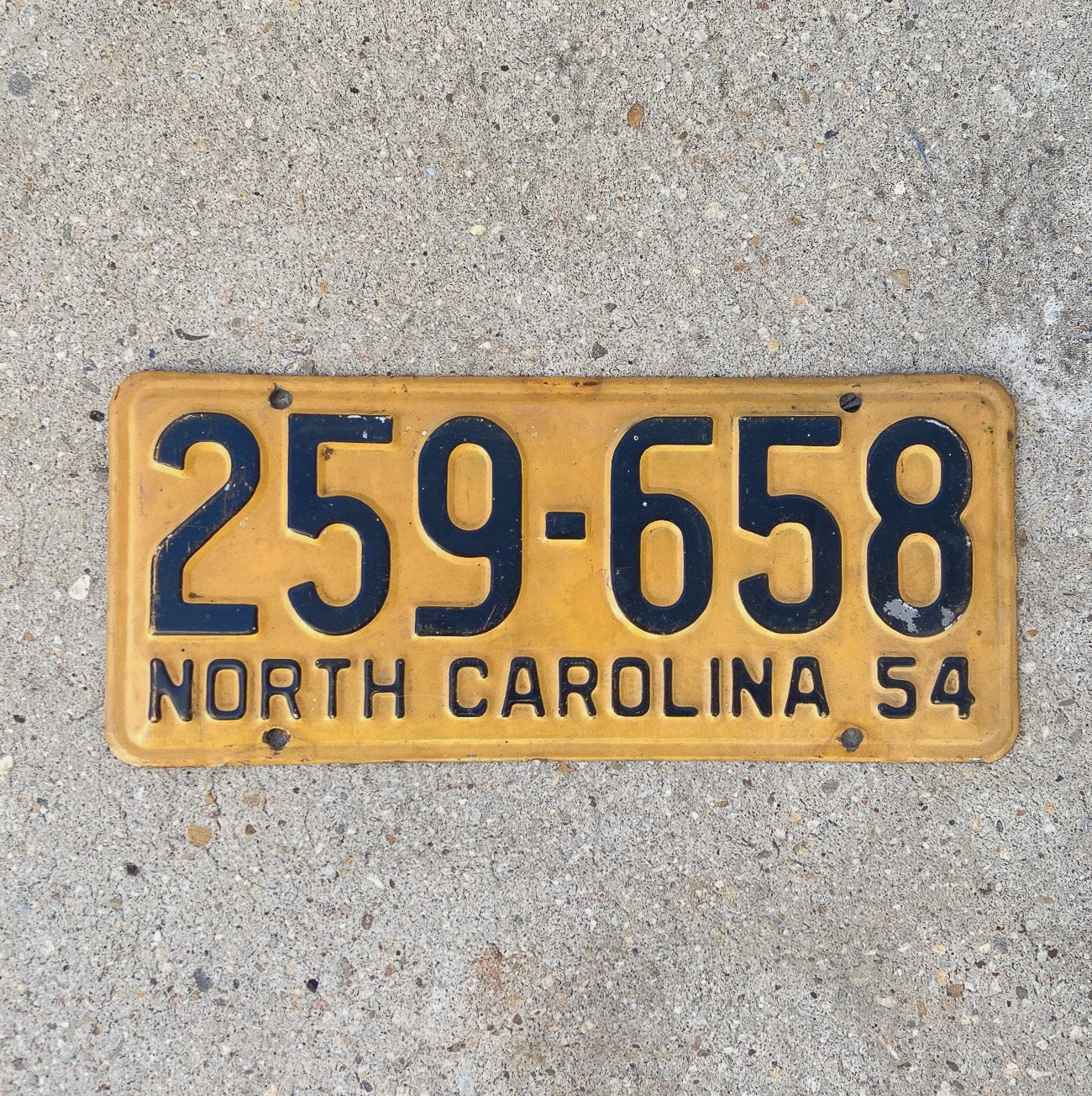 Photo of a 1954 North Carolina License Plate Auto Tag Garage Decor Vintage 259 658 with original patina