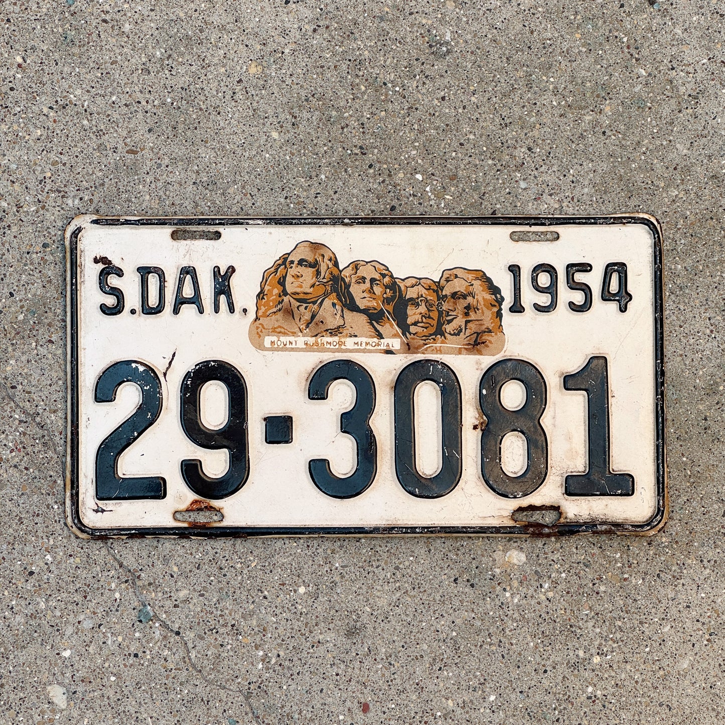 Photo of a 1954 South Dakota License Plate Auto Tag Garage Decor Vintage Mount Rushmore 29 3081 with original patina