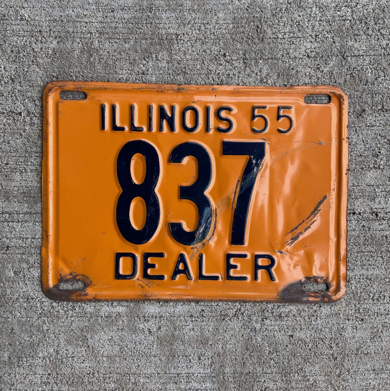Photo of a 1955 Illinois Dealer License Plate Auto Tag Garage Decor Vintage Low Number Three Digit 837 with original patina