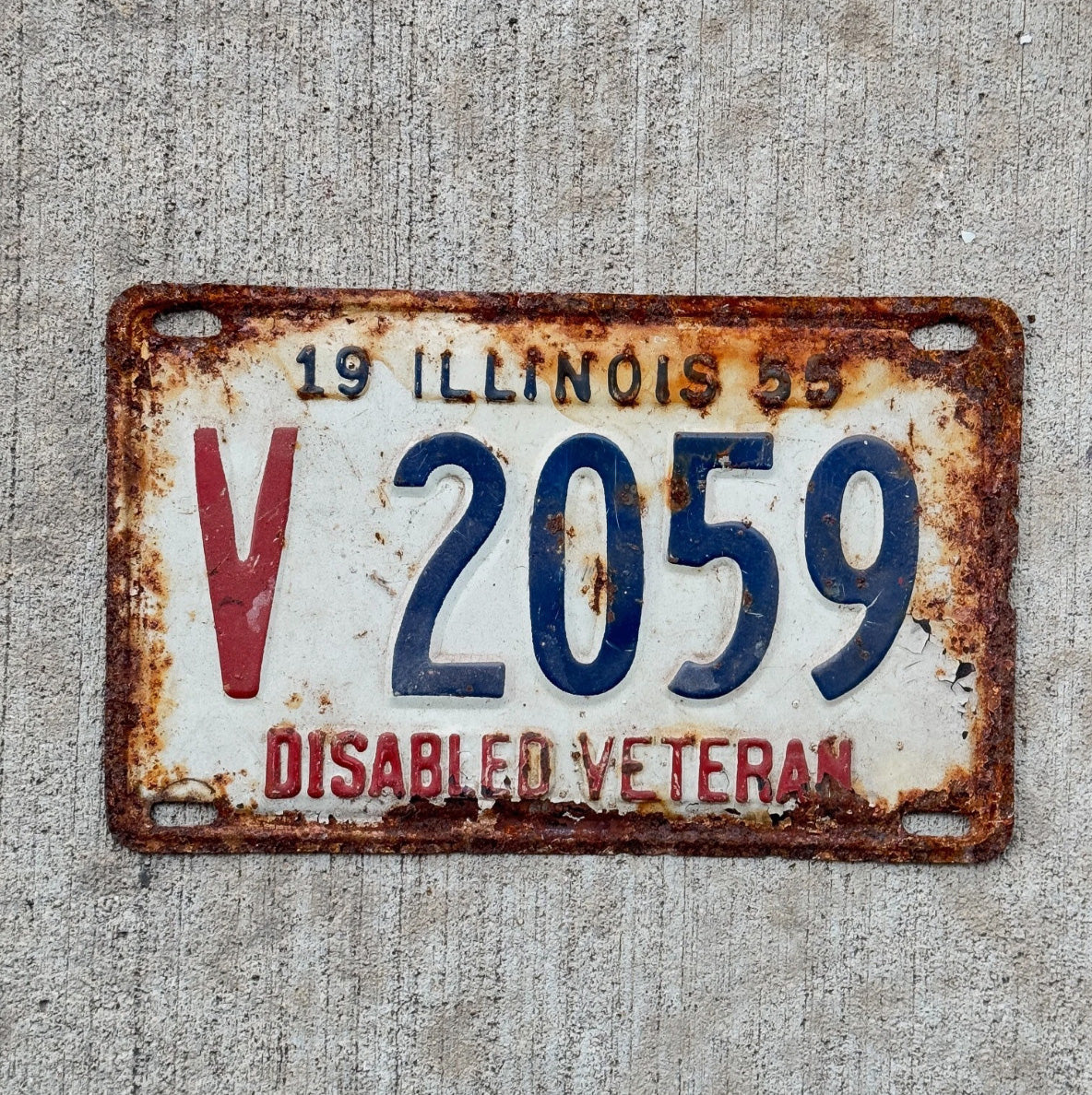 Photo of a 1955 Illinois Disabled Veteran License Plate Auto Tag 2 Garage Decor DAV V 2059