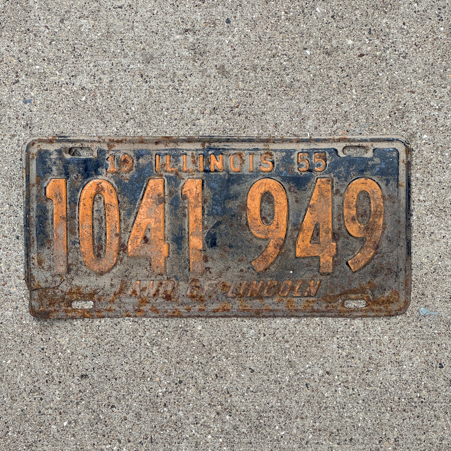 Photo of a 1955 Illinois License Plate Auto Tag 1 Vintage Garage Orange Blue 1 041 949 with original patina