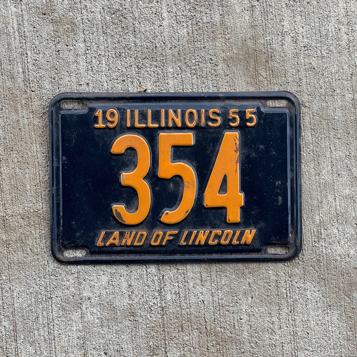 Photo of a 1955 Illinois License Plate Auto Tag Garage Decor Vintage Low Number Three Digit 354 with original patina