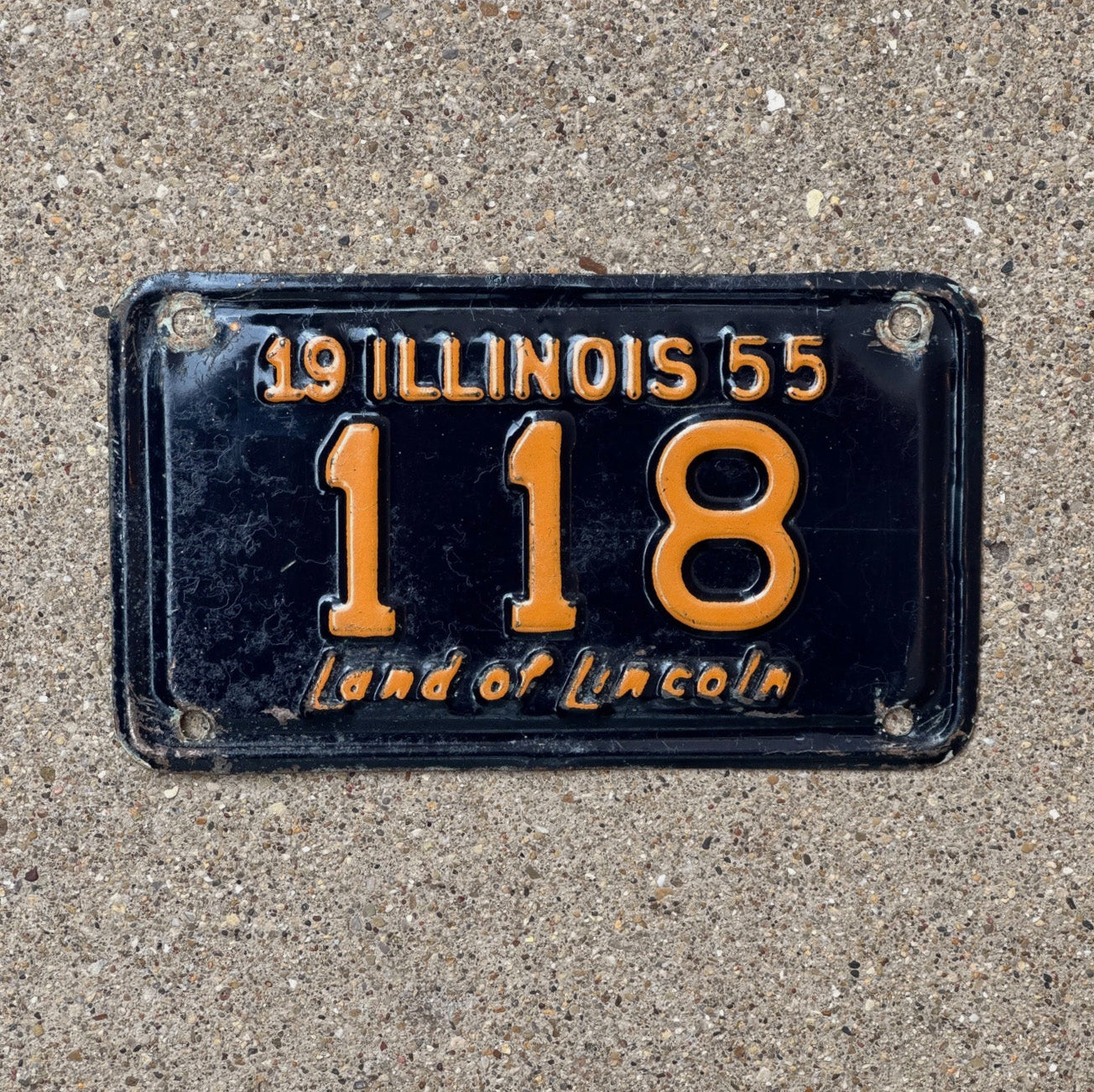 Photo of a 1955 Illinois Motorcycle License Plate Auto Tag Garage Decor Vintage Low Number Three Digit 118 with original patina