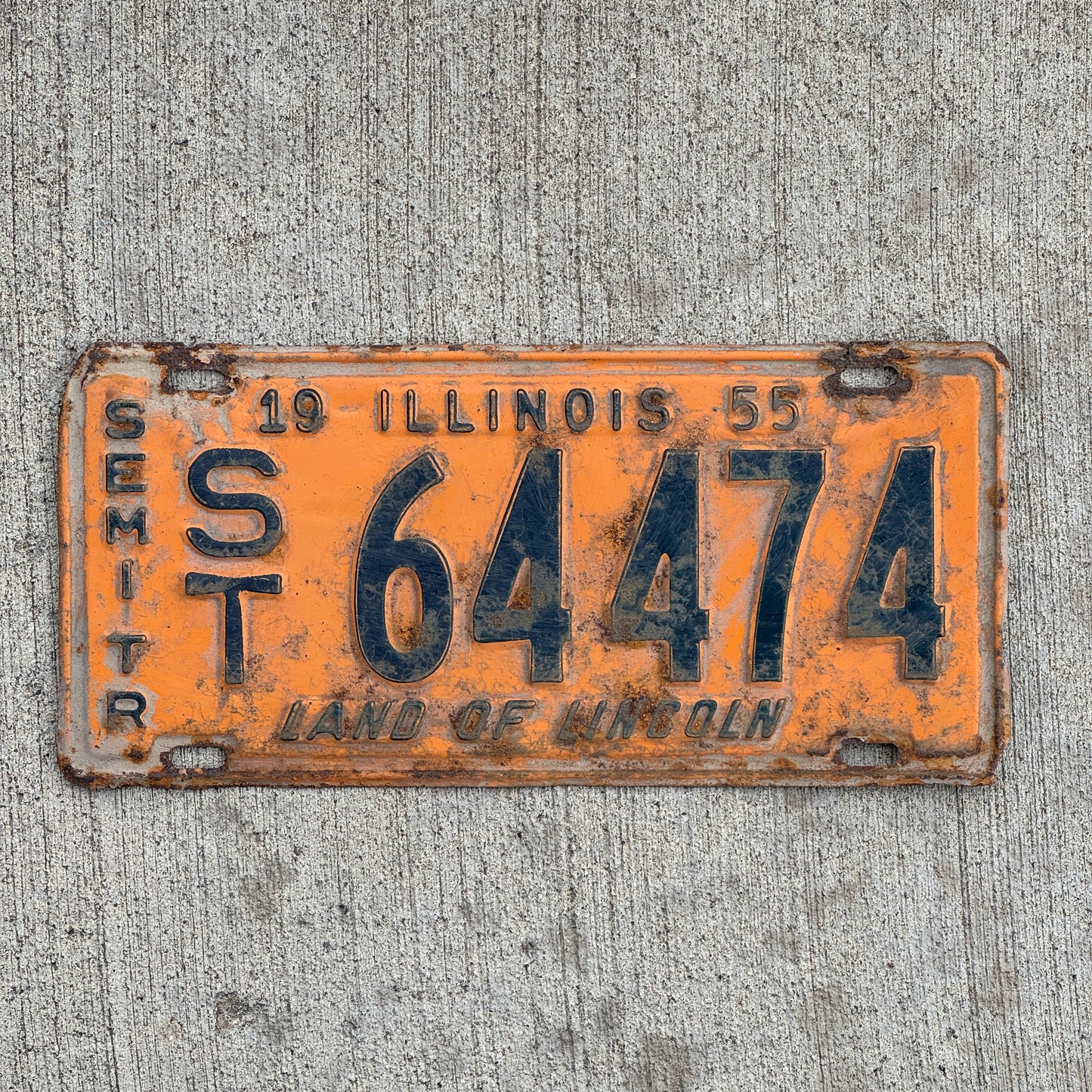 Photo of a 1955 Illinois Semi Trailer License Plate Auto Tag Garage Decor Vintage Orange Blue ST 64474 with original patina