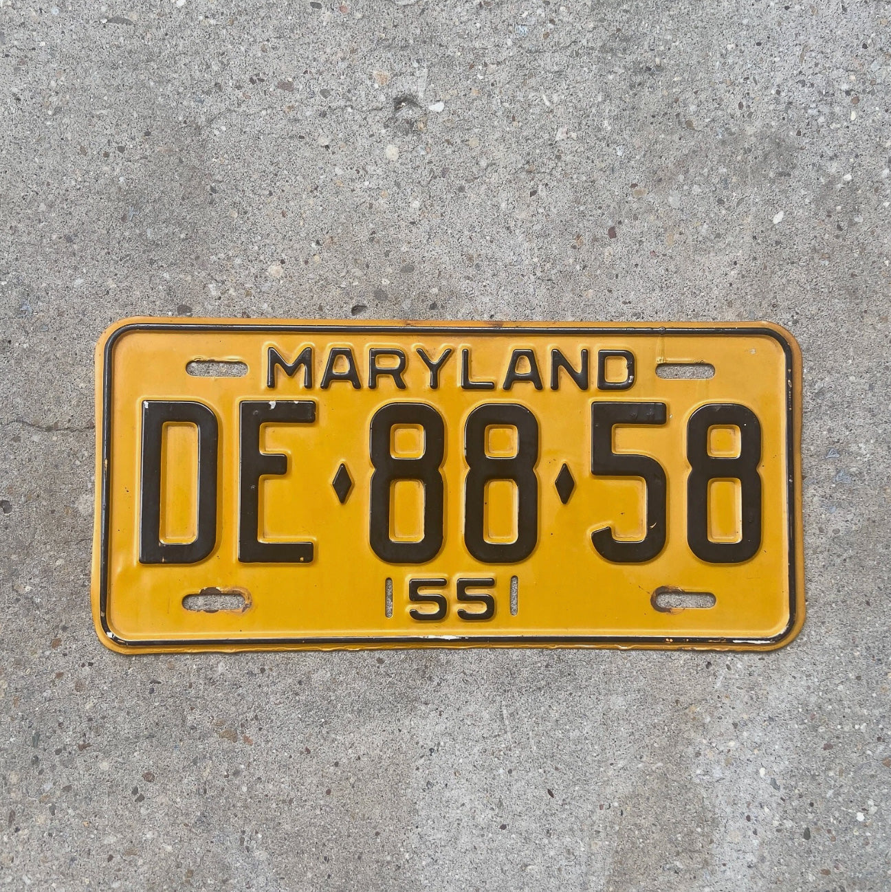 Photo of a 1955 Maryland License Plate Auto Tag Garage Decor Vintage DE 8858 with original patina