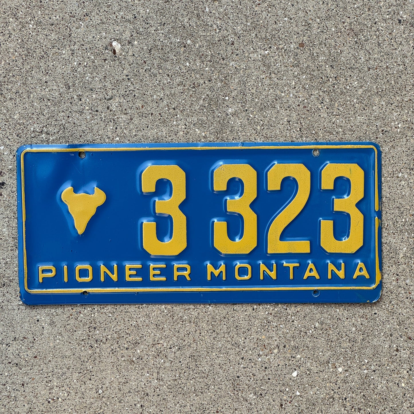 Photo of a 1955 Montana Pioneer License Plate Auto Tag 1 Garage Decor Bison Head 3323