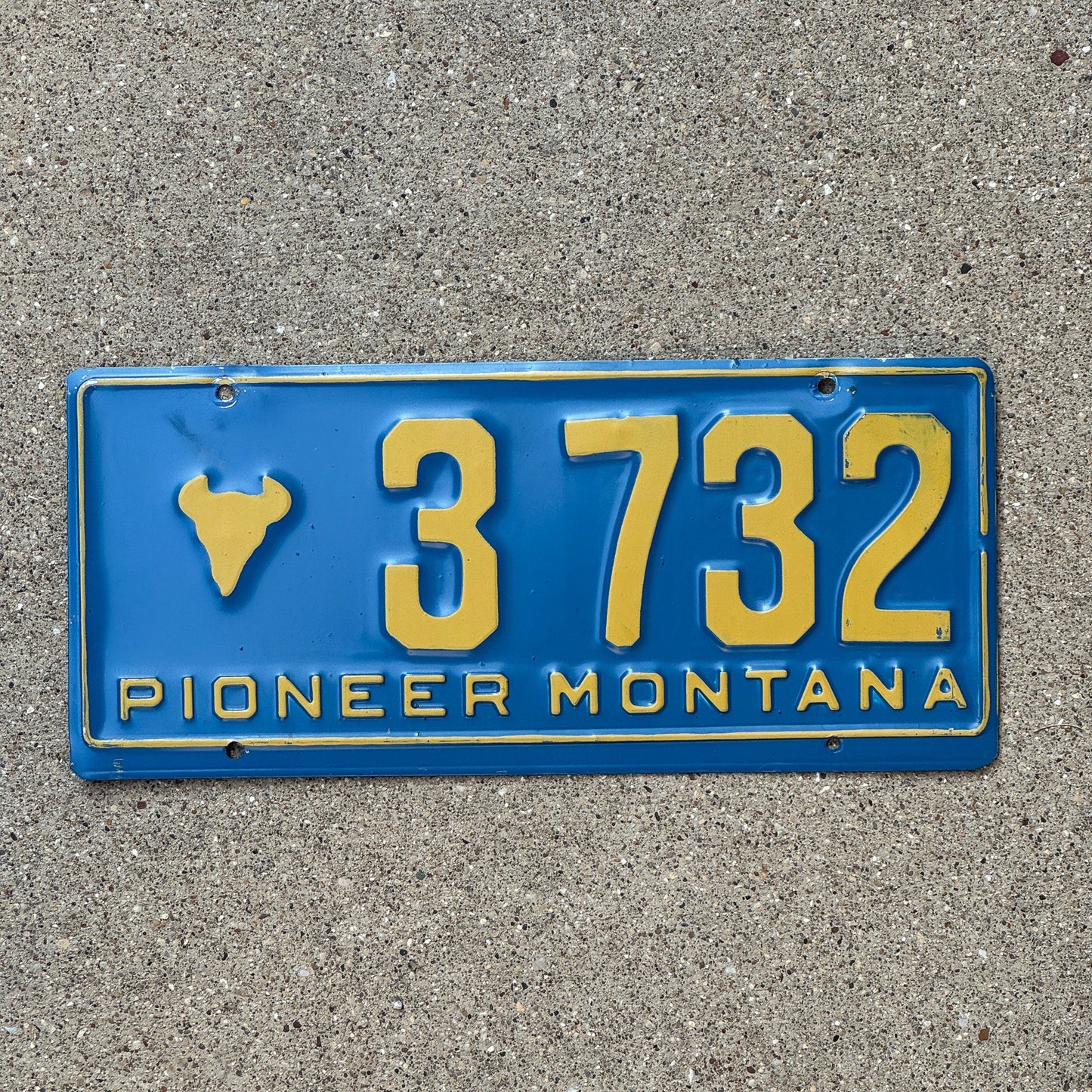 Photo of a 1955 Montana Pioneer License Plate Auto Tag 1 Garage Decor Bison Head 3732