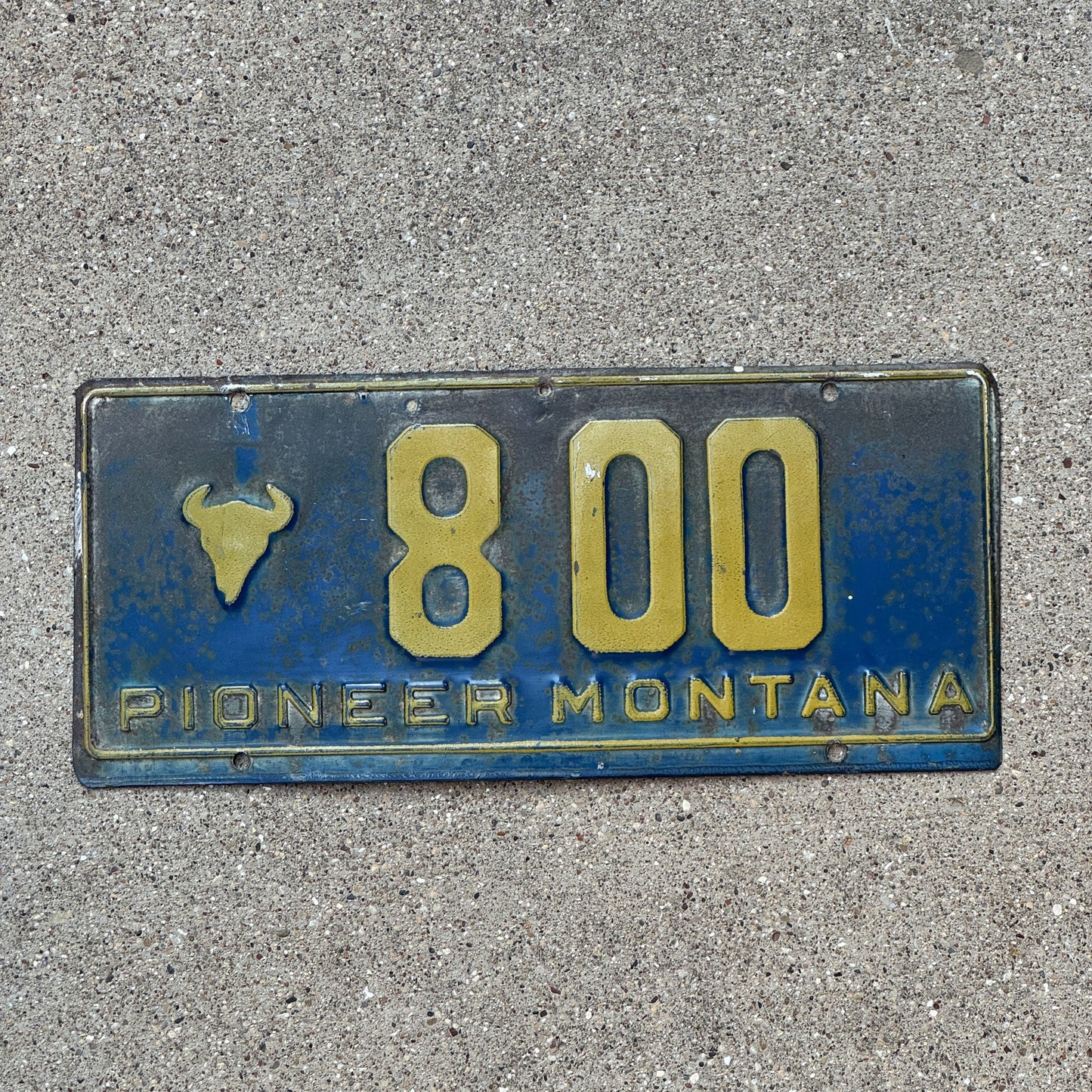 Photo of a 1955 Montana Pioneer License Plate Auto Tag 1 Garage Decor Bison Head Three Digit 800