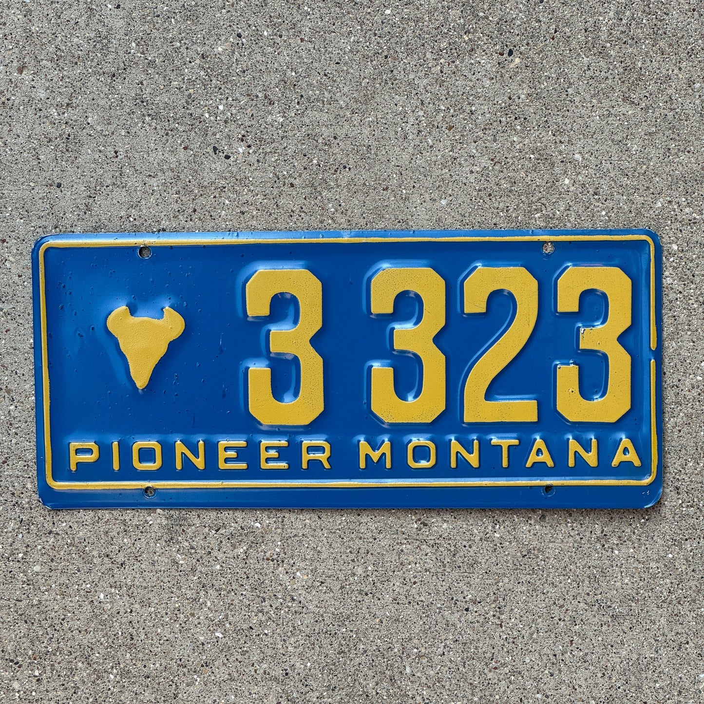 Photo of a 1955 Montana Pioneer License Plate Auto Tag 2 Garage Decor Bison Head 3323