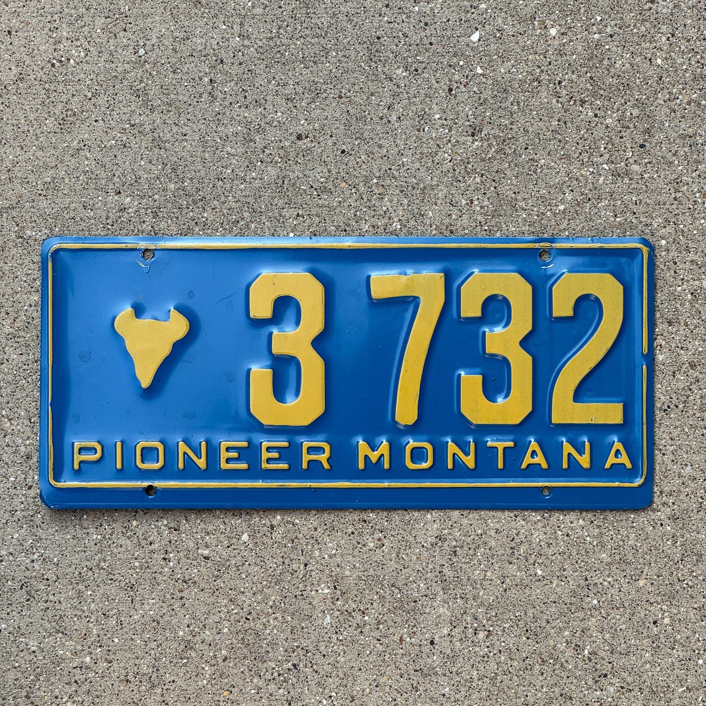 Photo of a 1955 Montana Pioneer License Plate Auto Tag 2 Garage Decor Bison Head 3732