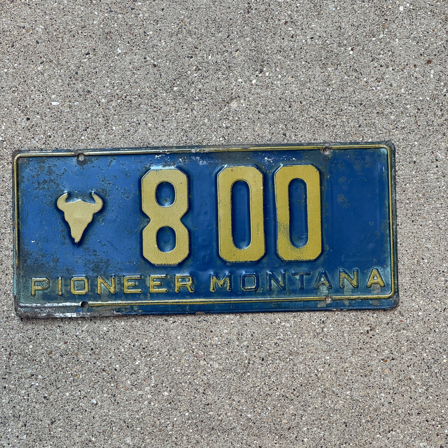 Photo of a 1955 Montana Pioneer License Plate Auto Tag 2 Garage Decor Bison Head Three Digit 800